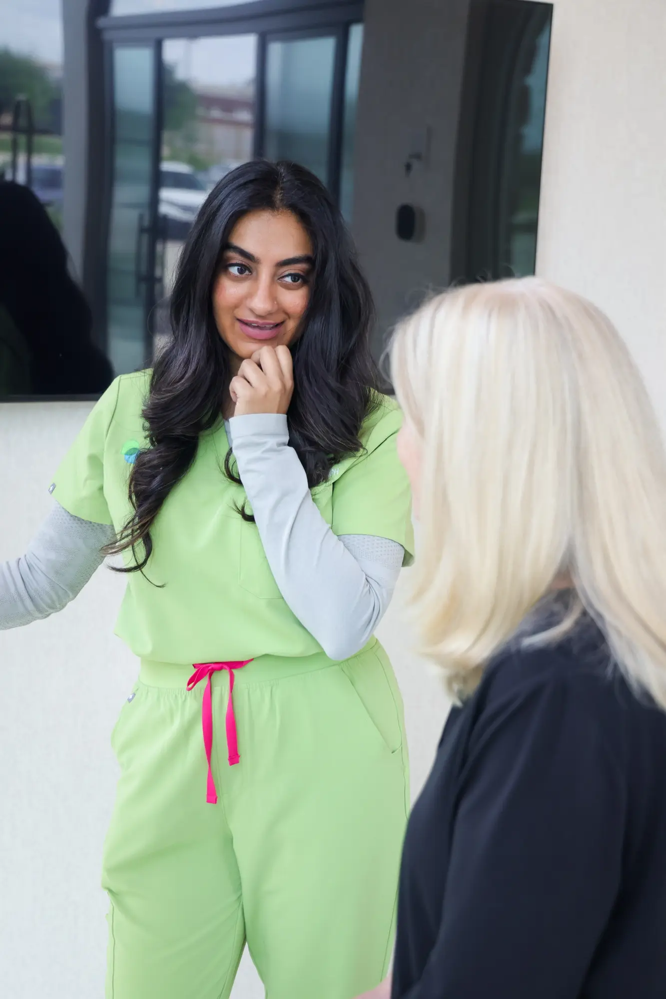 Dr. Sophia Ali reviewing a patient's skin analysis during a consultation at Skin Talk