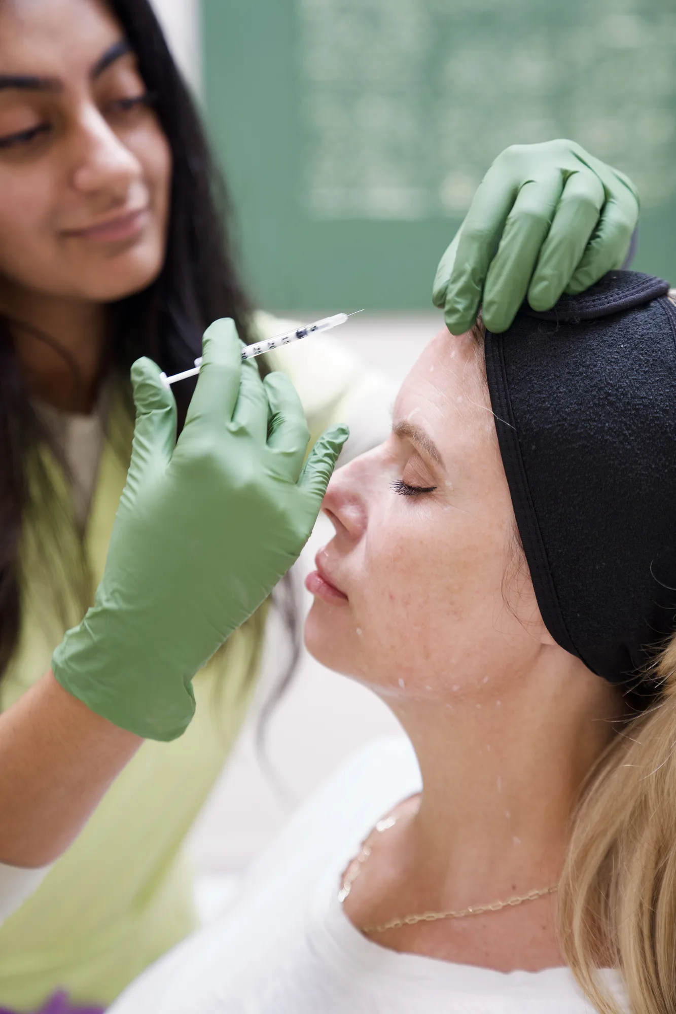 Dr. Sophia Ali placing forehead neuromodulator injections at Skin Talk in Richmond, TX